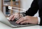 a person is typing on the keyboard and researching some keywords via using AI tools