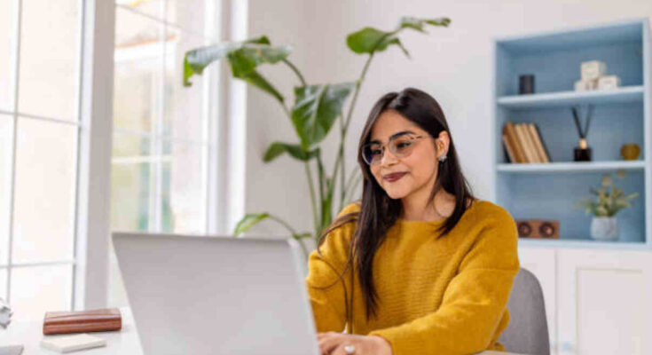 A woman reading through online app Libgen